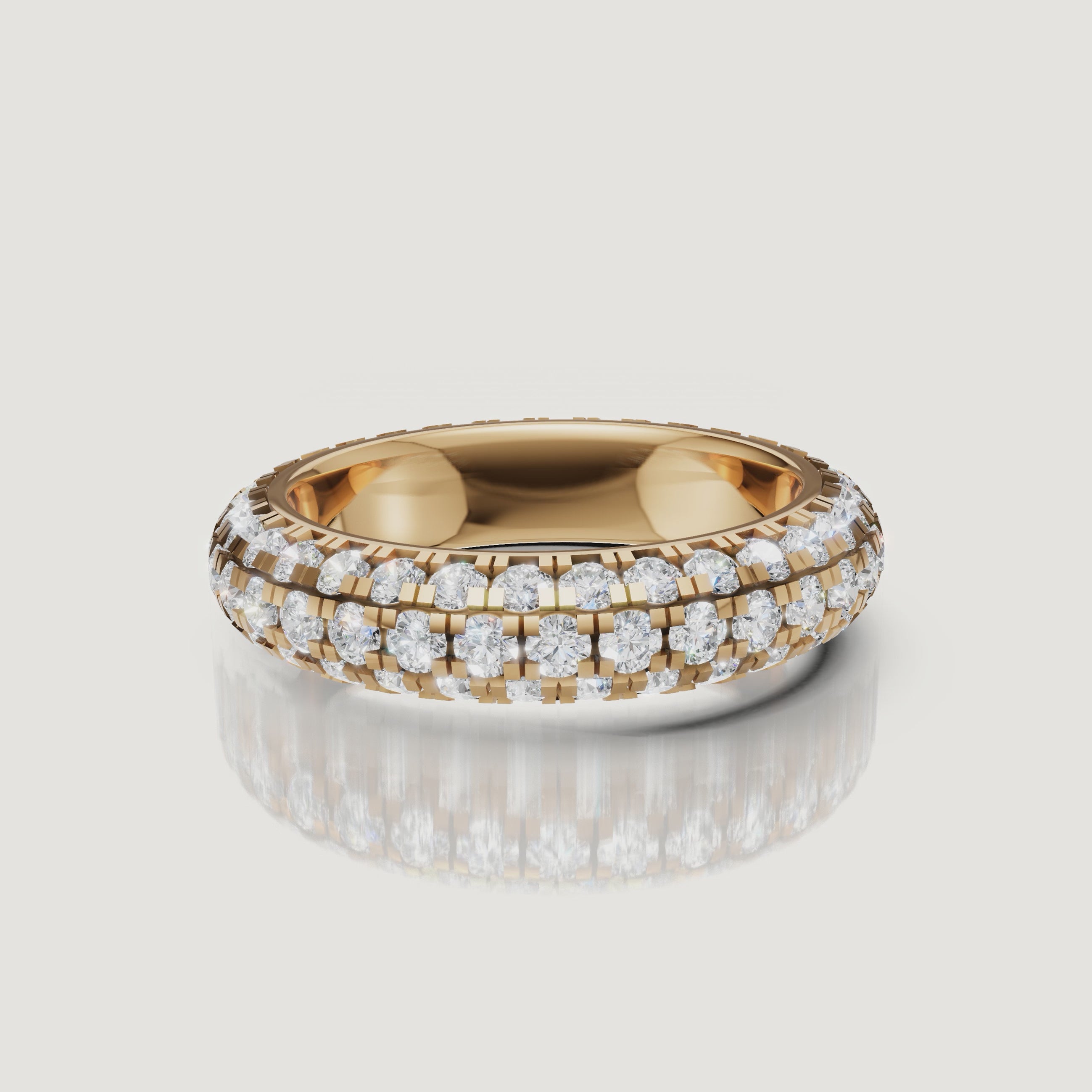 rotating view of triple row pavé lab grown diamond wedding band in polished gold