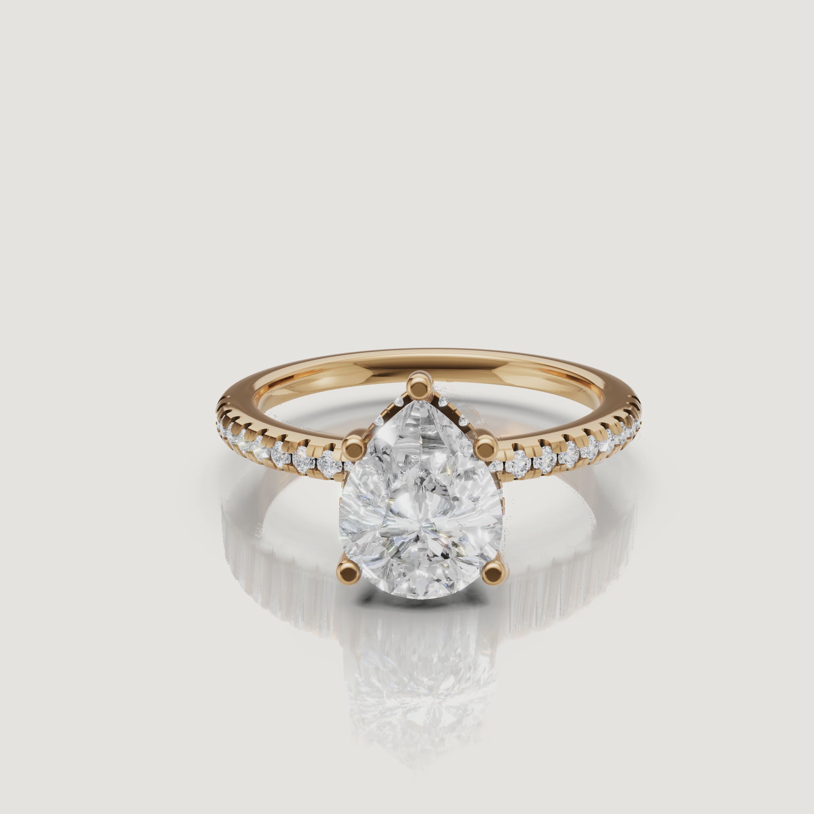 rotating view of pear cut lab grown diamond engagement ring with pavé band