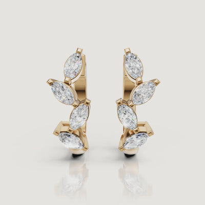 Yellow gold marquise diamond hoop earrings cinematic jewelry video by Raul Diamonds