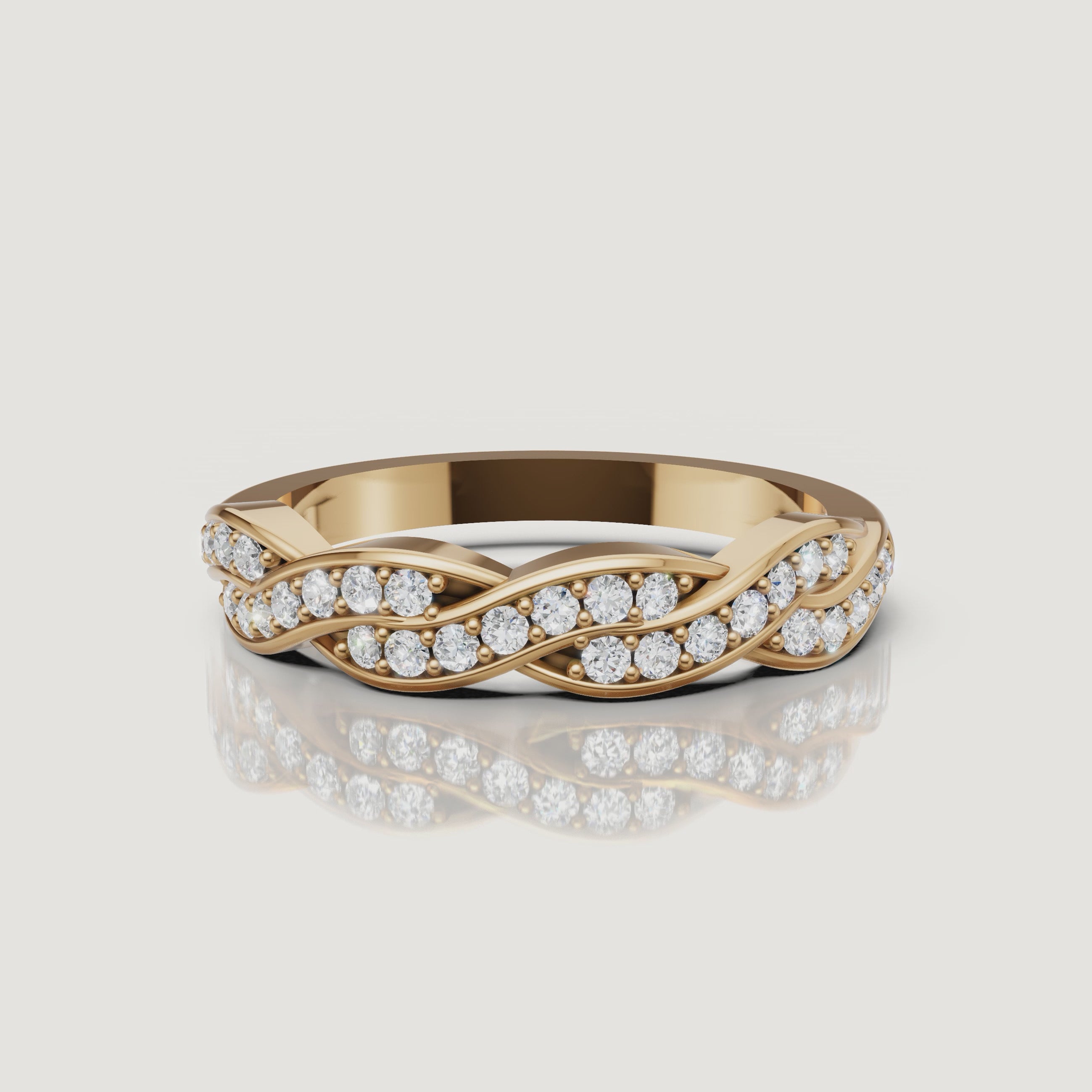 Yellow gold braided diamond wedding band video with sparkling pavé setting by Raul Diamonds