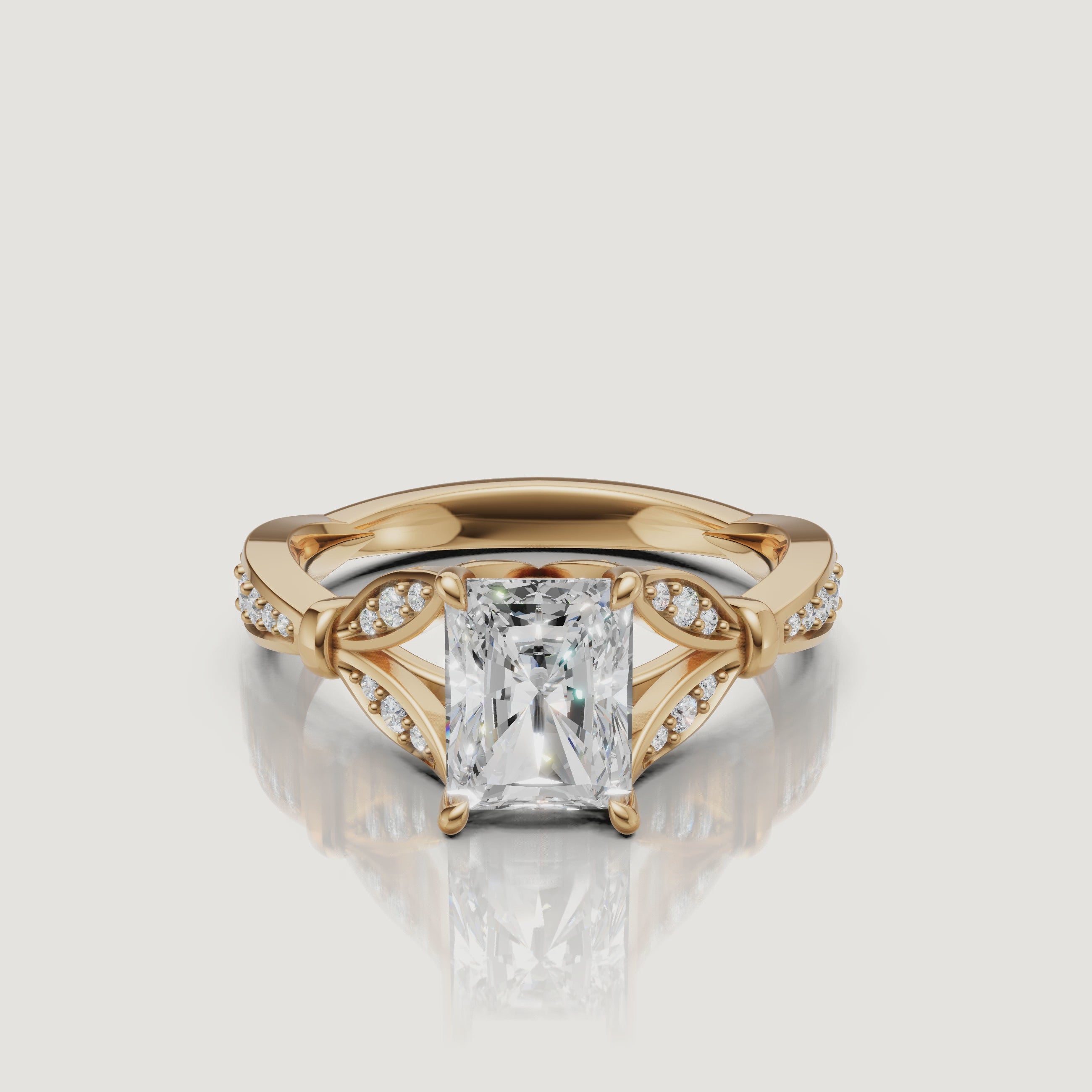 Rotating video of Raul Diamonds radiant cut lab grown diamond engagement ring in 14K yellow gold with pavé accents