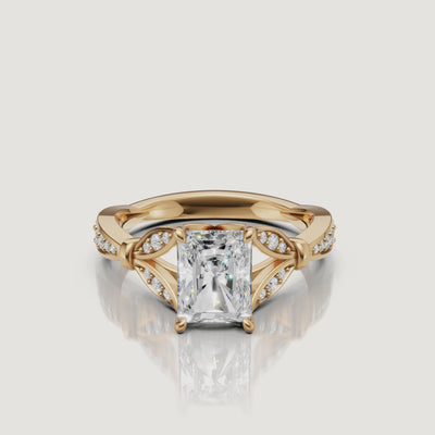 Rotating video of Raul Diamonds radiant cut lab grown diamond engagement ring in 14K yellow gold with pavé accents