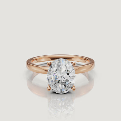 360-degree video showcase of a rose gold oval cut diamond ring by Raul Diamonds, highlighting the warm blush tones and the diamond's exceptional fire.