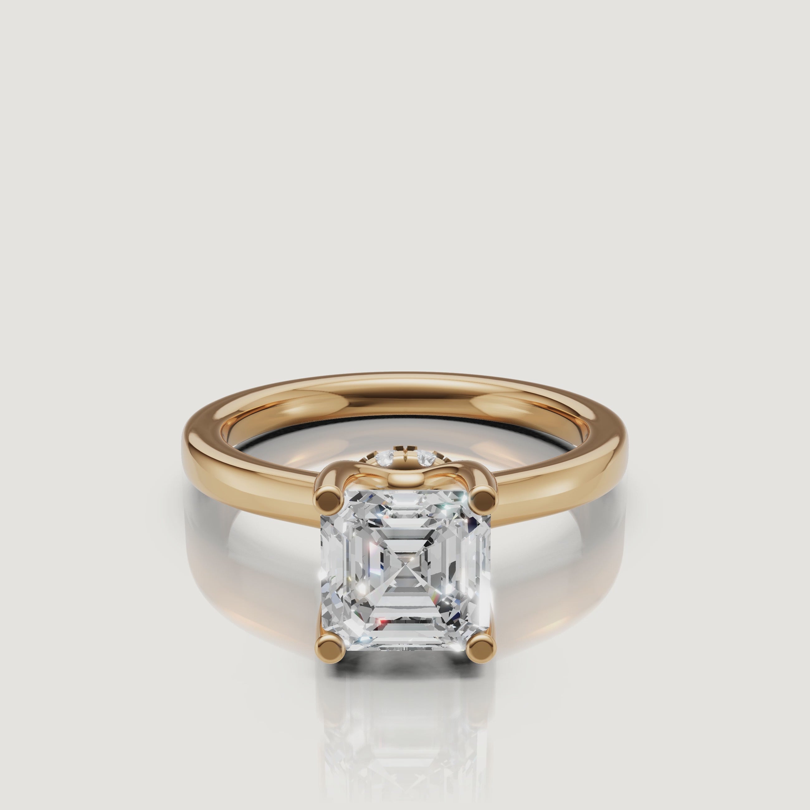 Cinematic video showing the 360-degree sparkle of a Raul Diamonds yellow gold Asscher ring with a sparkling diamond-encrusted hidden halo collar