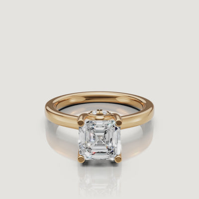 Cinematic video showing the 360-degree sparkle of a Raul Diamonds yellow gold Asscher ring with a sparkling diamond-encrusted hidden halo collar