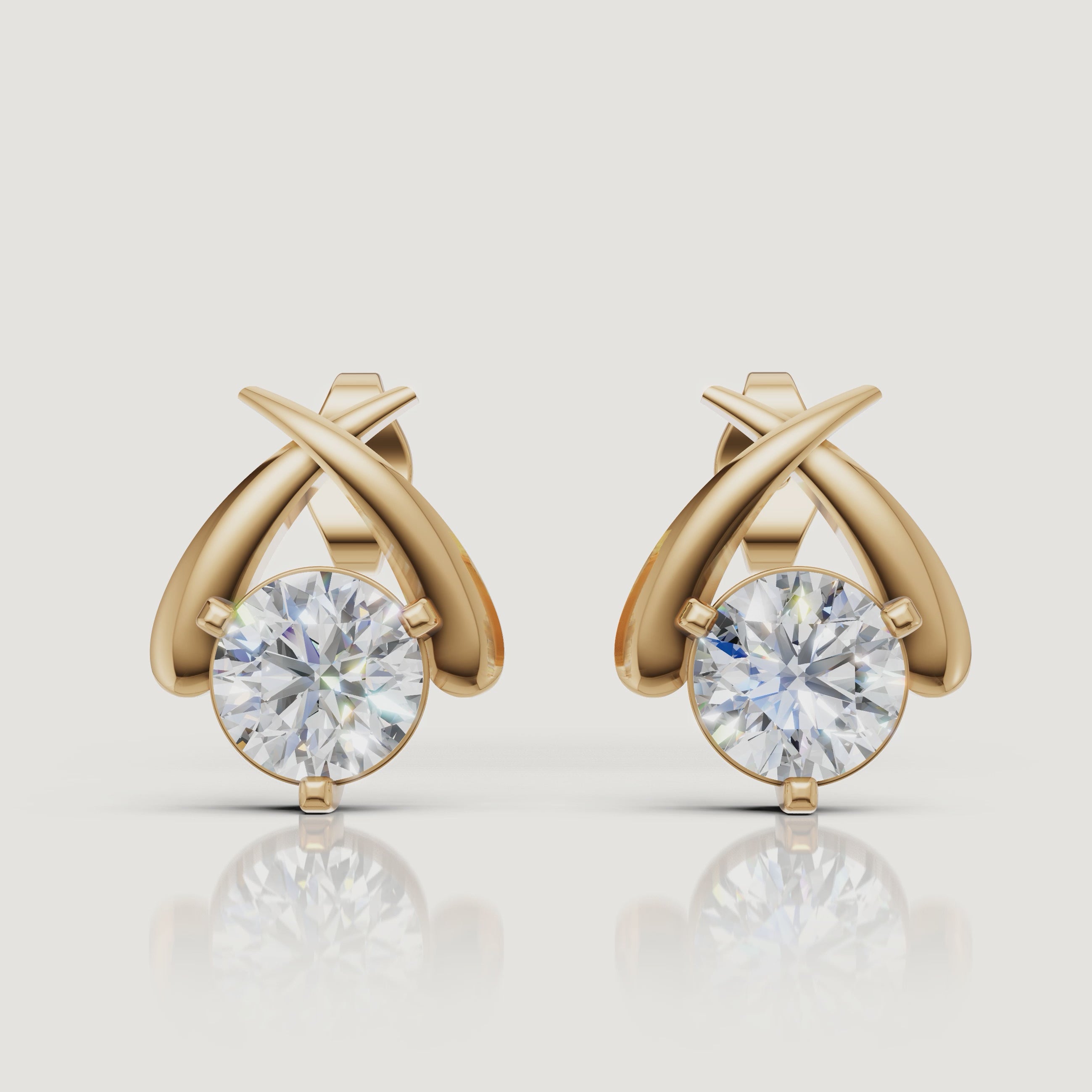 Yellow gold crossover diamond earrings cinematic jewelry video by Raul Diamonds
