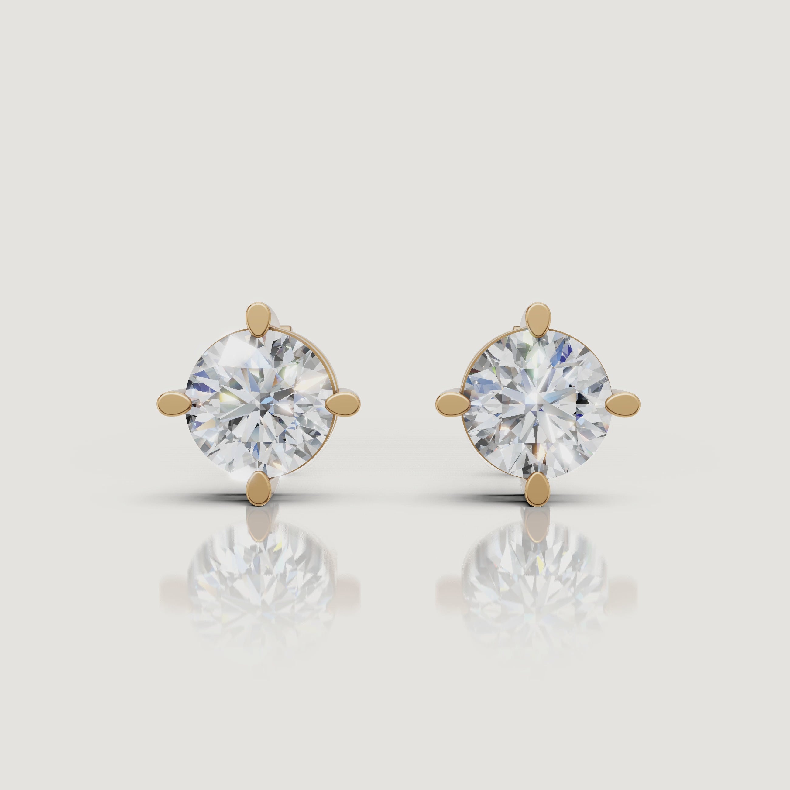 Yellow gold round solitaire diamond stud earrings video showcasing brilliant sparkle by Raul Diamonds
