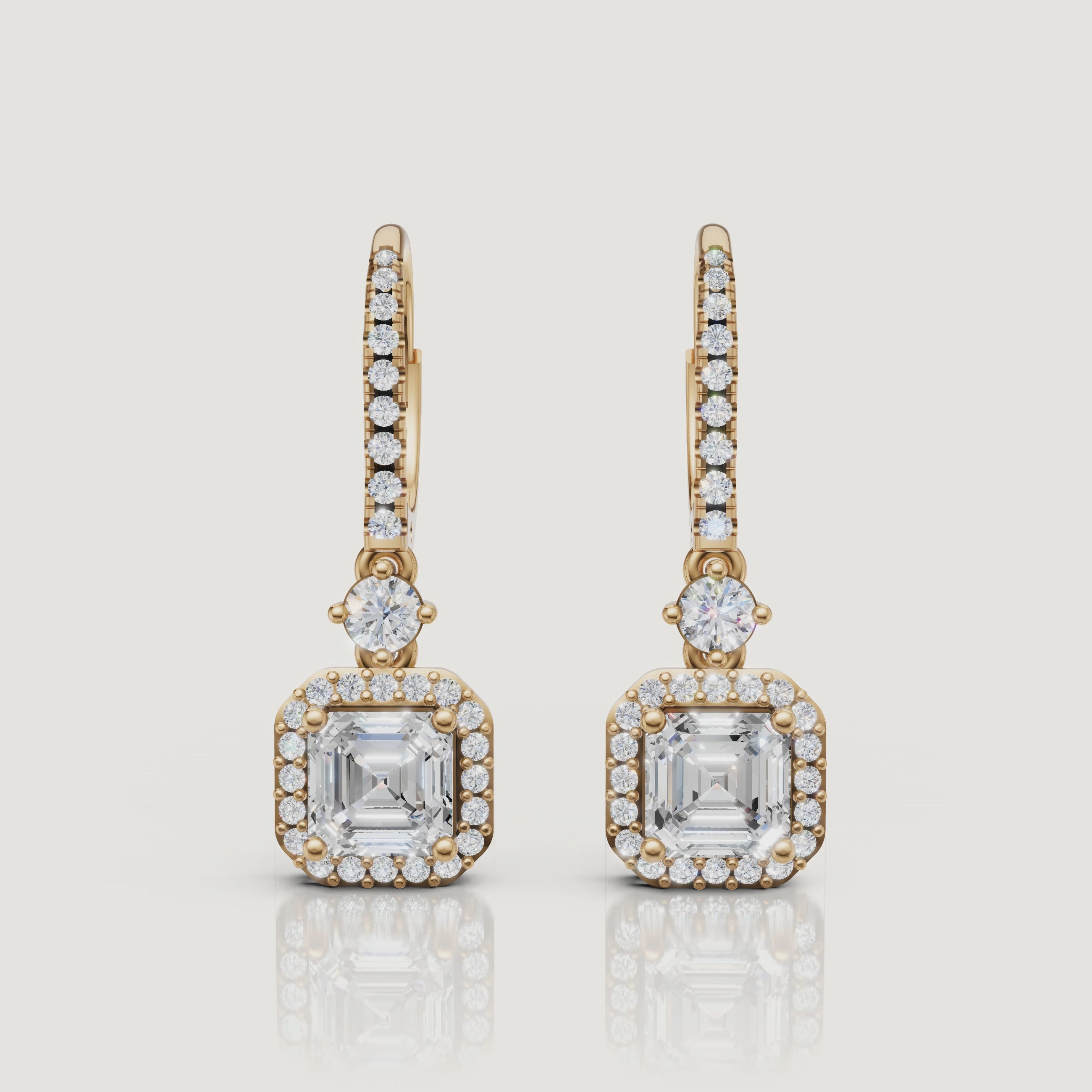 Yellow gold asscher halo diamond drop earrings luxury sparkle video by Raul Diamonds