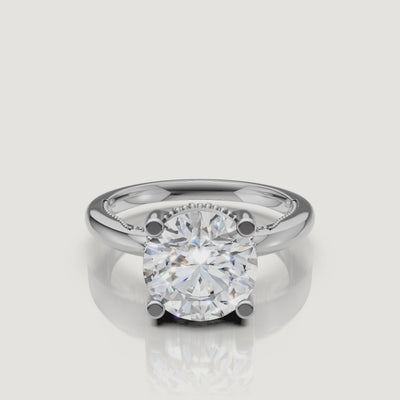 Macro video showcase of a white gold round solitaire ring by Raul Diamonds, displaying the perfect symmetry and brilliant white scintillation