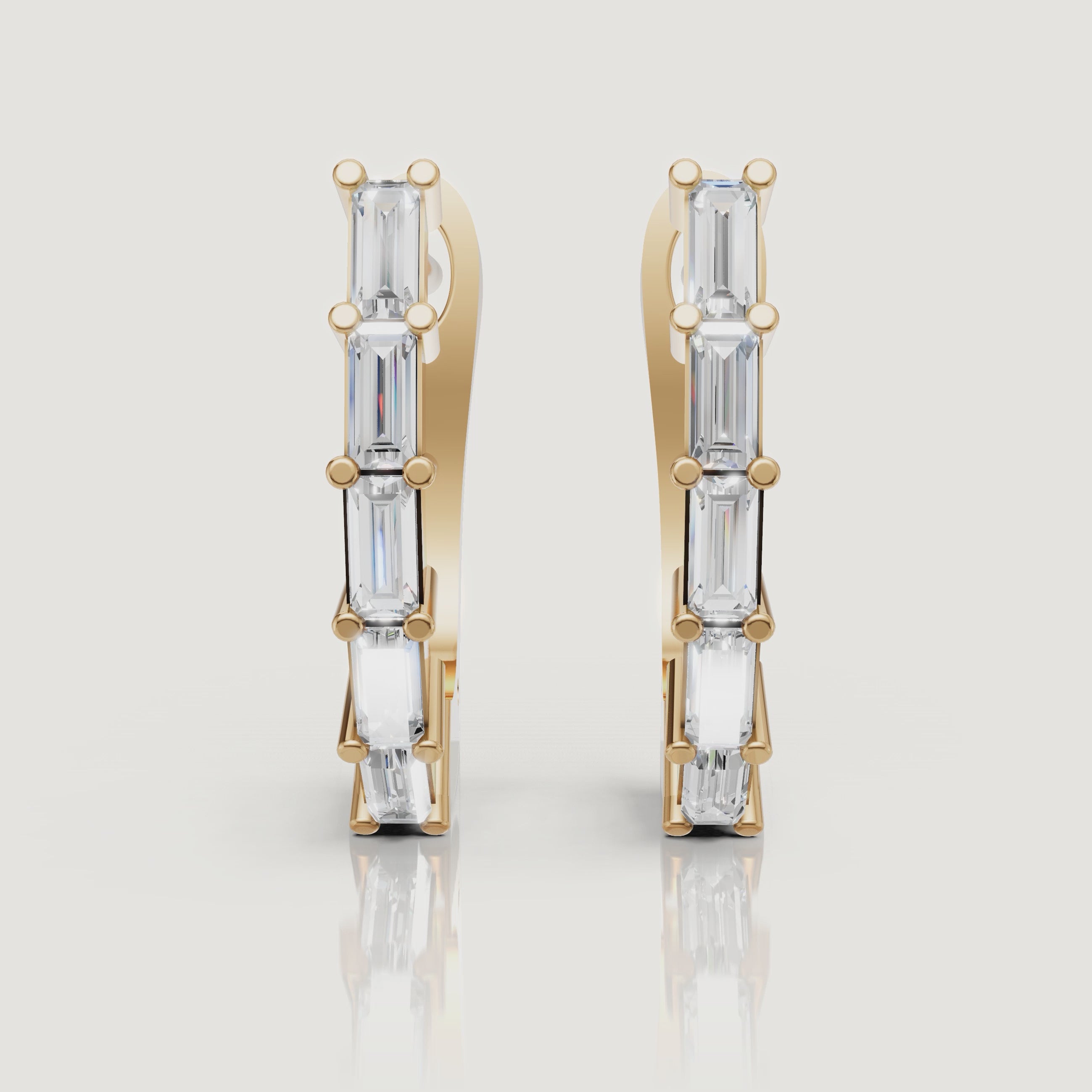 Yellow gold baguette diamond hoop earrings video by Raul Diamonds