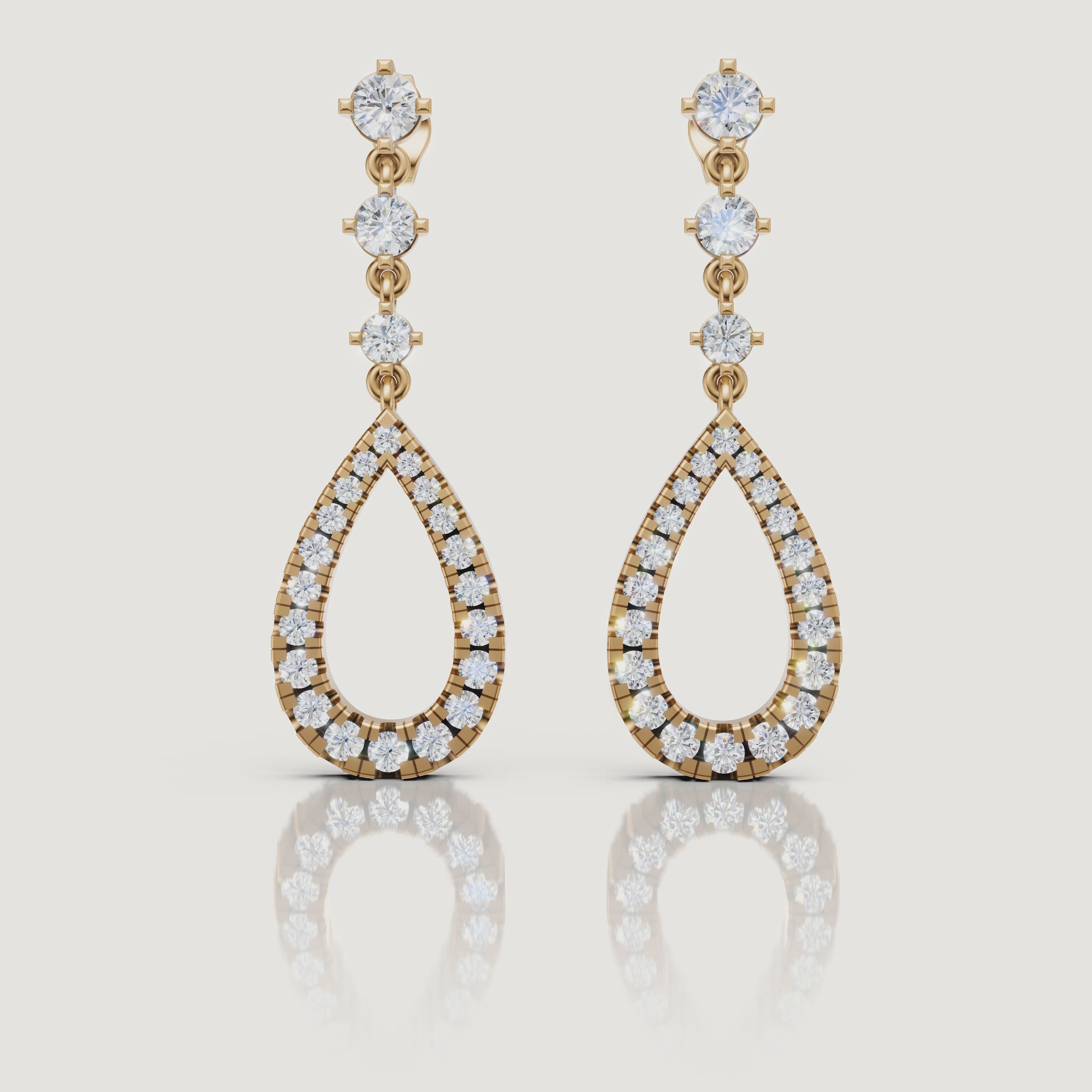 Yellow gold diamond teardrop earrings sparkling video Raul Diamonds