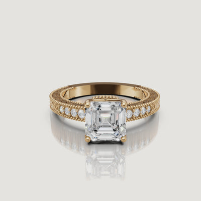 360 video of vintage Asscher cut lab grown diamond engagement ring in 14K yellow gold with ornate filigree band by Raul Diamonds.