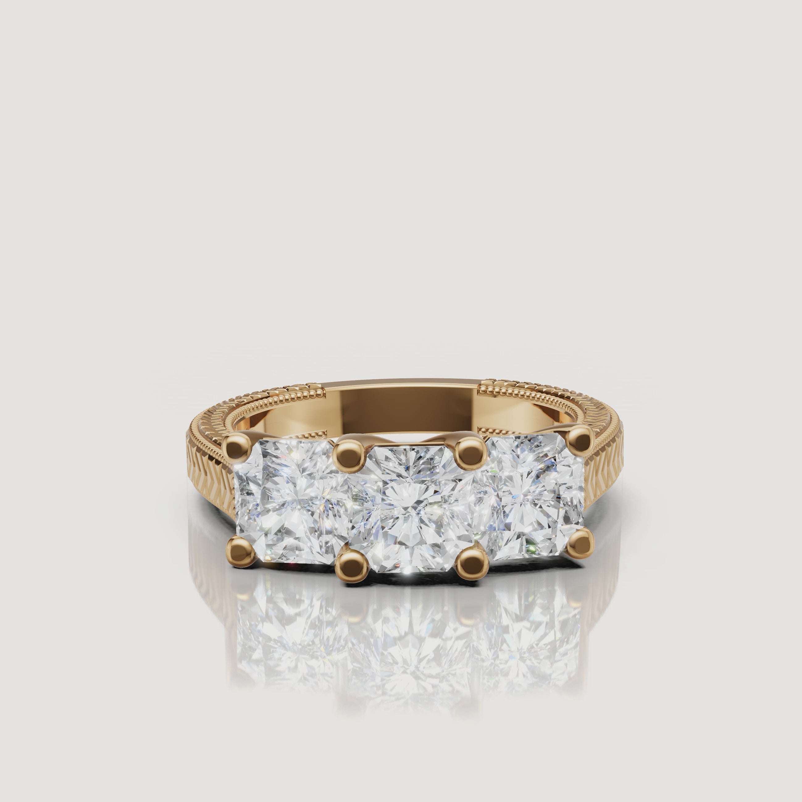 360 video of Raul Diamonds three stone round diamond ring in yellow gold with vintage detailing.