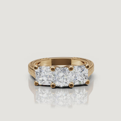 360 video of Raul Diamonds three stone round diamond ring in yellow gold with vintage detailing.