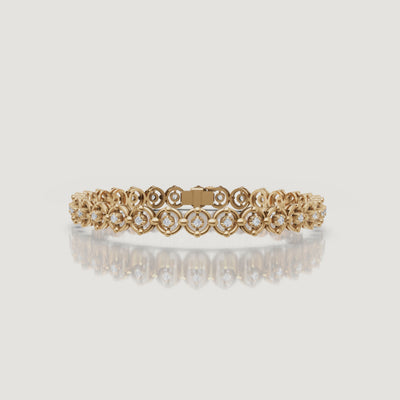 Luxury yellow gold floral diamond bracelet video by Raul Diamonds with sparkling lab grown diamonds, cinematic close-up wrist shots, elegant hand movement, and premium fine jewelry styling
