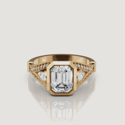 360 video of the Seo yellow gold emerald cut bezel diamond engagement ring by Raul Diamonds.