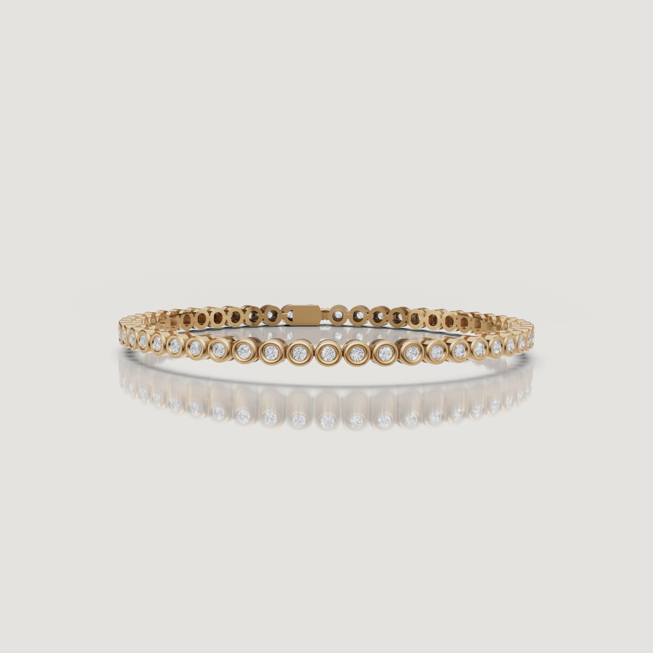 Luxury yellow gold bezel-set diamond bracelet video by Raul Diamonds featuring brilliant lab grown diamonds, elegant wrist movement, cinematic macro close-ups, soft luxury lighting, and timeless fine jewelry styling for a sophisticated modern look