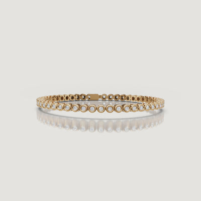 Luxury yellow gold bezel-set diamond bracelet video by Raul Diamonds featuring brilliant lab grown diamonds, elegant wrist movement, cinematic macro close-ups, soft luxury lighting, and timeless fine jewelry styling for a sophisticated modern look