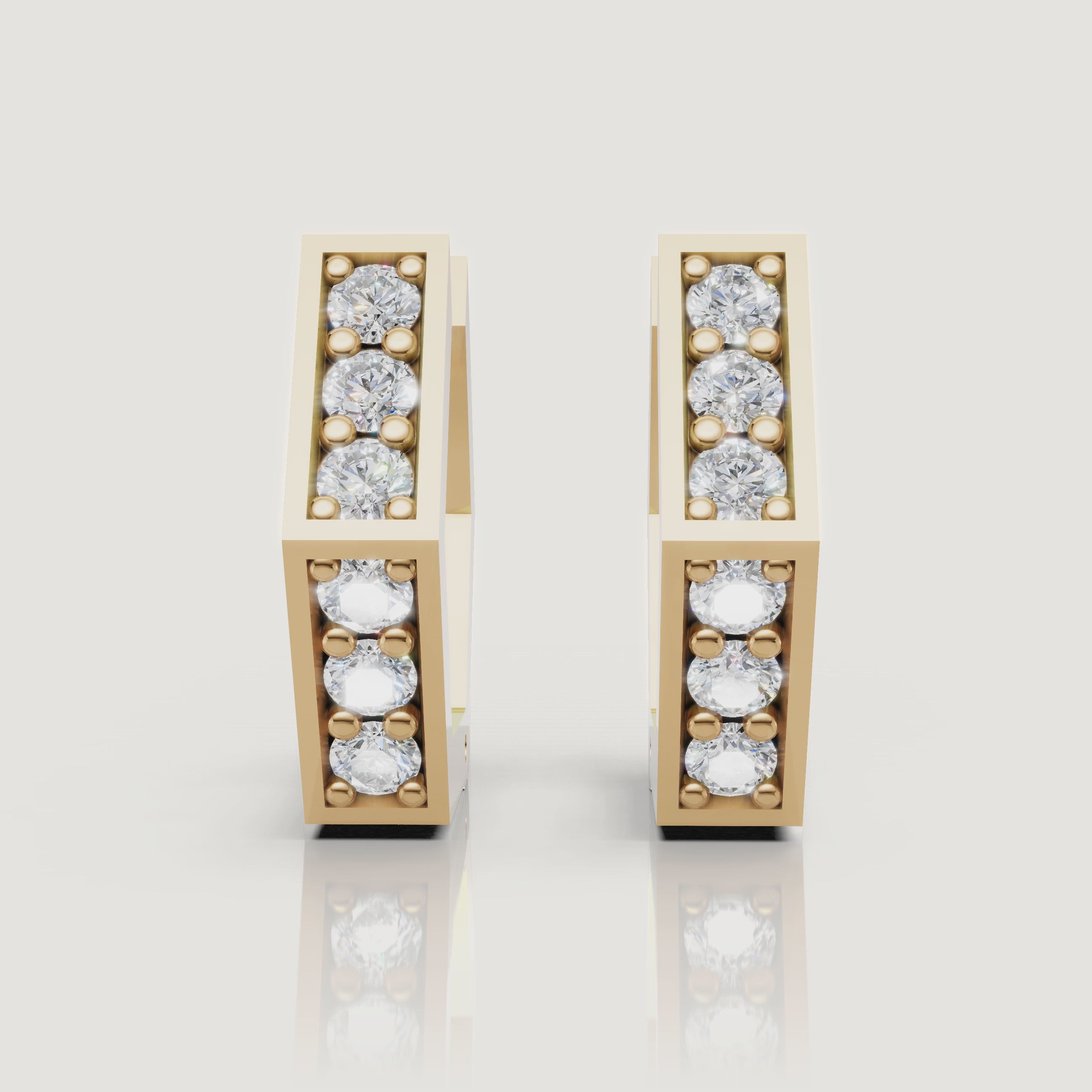 Yellow gold geometric diamond hoop earrings video with sparkling round diamonds by Raul Diamonds