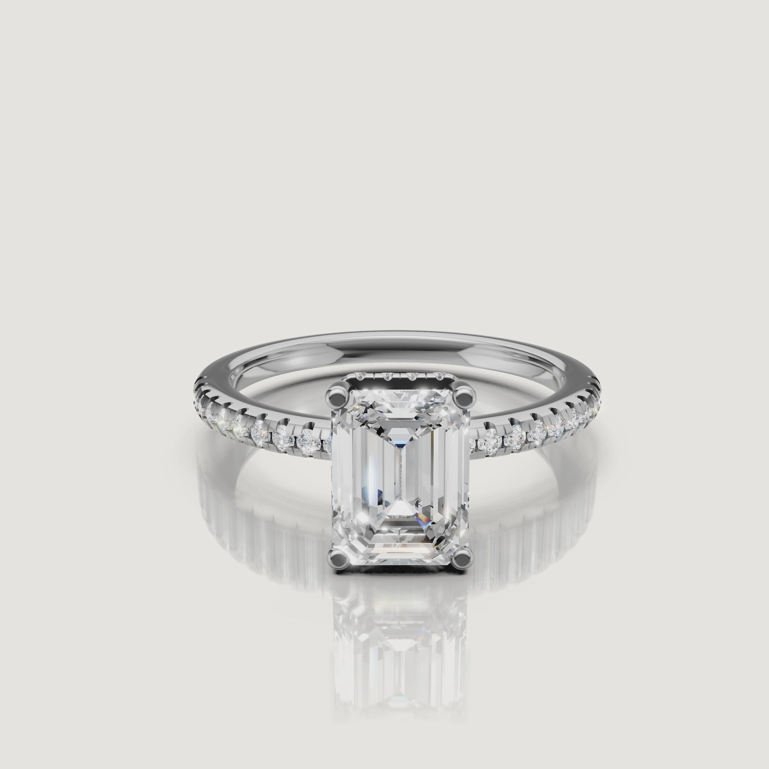 Professional video showcase of a white gold emerald cut engagement ring, emphasizing the 'hall of mirrors' center stone and Raul Diamonds signature craftsmanship.