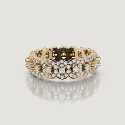 rotating view of floral cluster lab grown diamond eternity band in polished gold