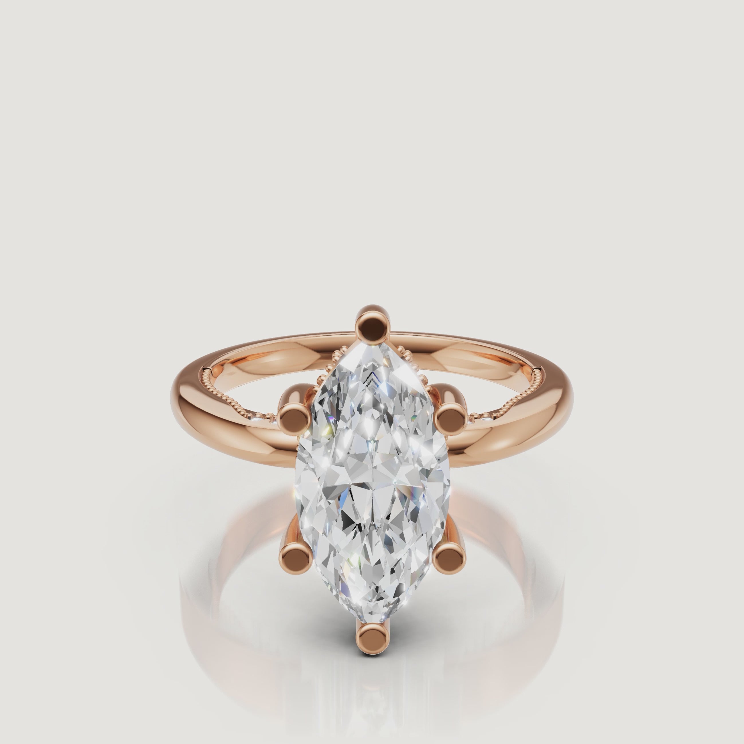 Close-up 4K video of a rose gold marquise diamond ring by Raul Diamonds, capturing the romantic pink metal and the crushed-ice effect of the facets.
