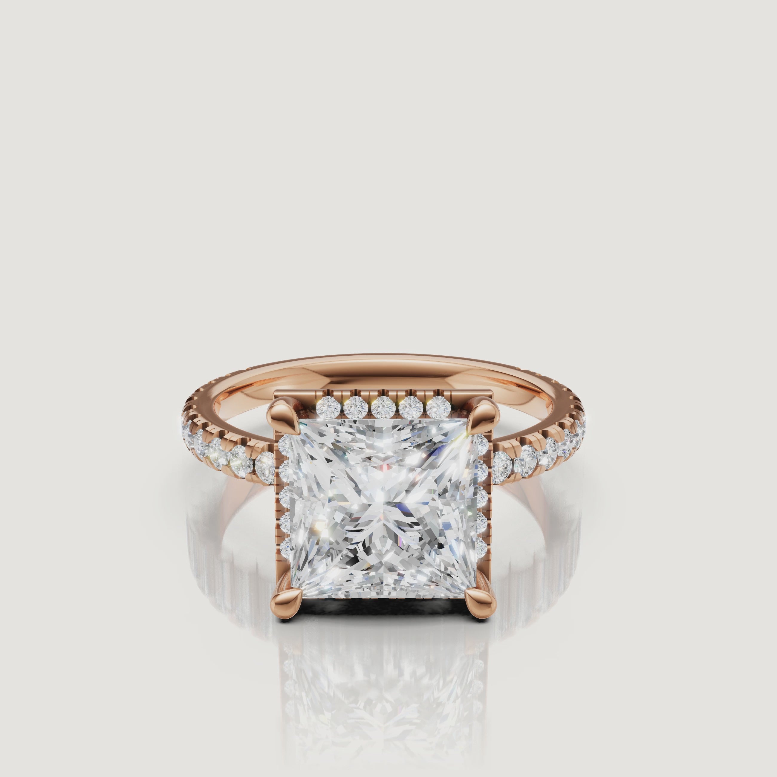 Macro sparkle video of a rose gold Princess cut diamond ring featuring a hidden halo and micro-pavé diamonds by Raul Diamonds