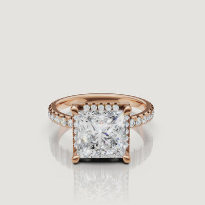 Macro sparkle video of a rose gold Princess cut diamond ring featuring a hidden halo and micro-pavé diamonds by Raul Diamonds