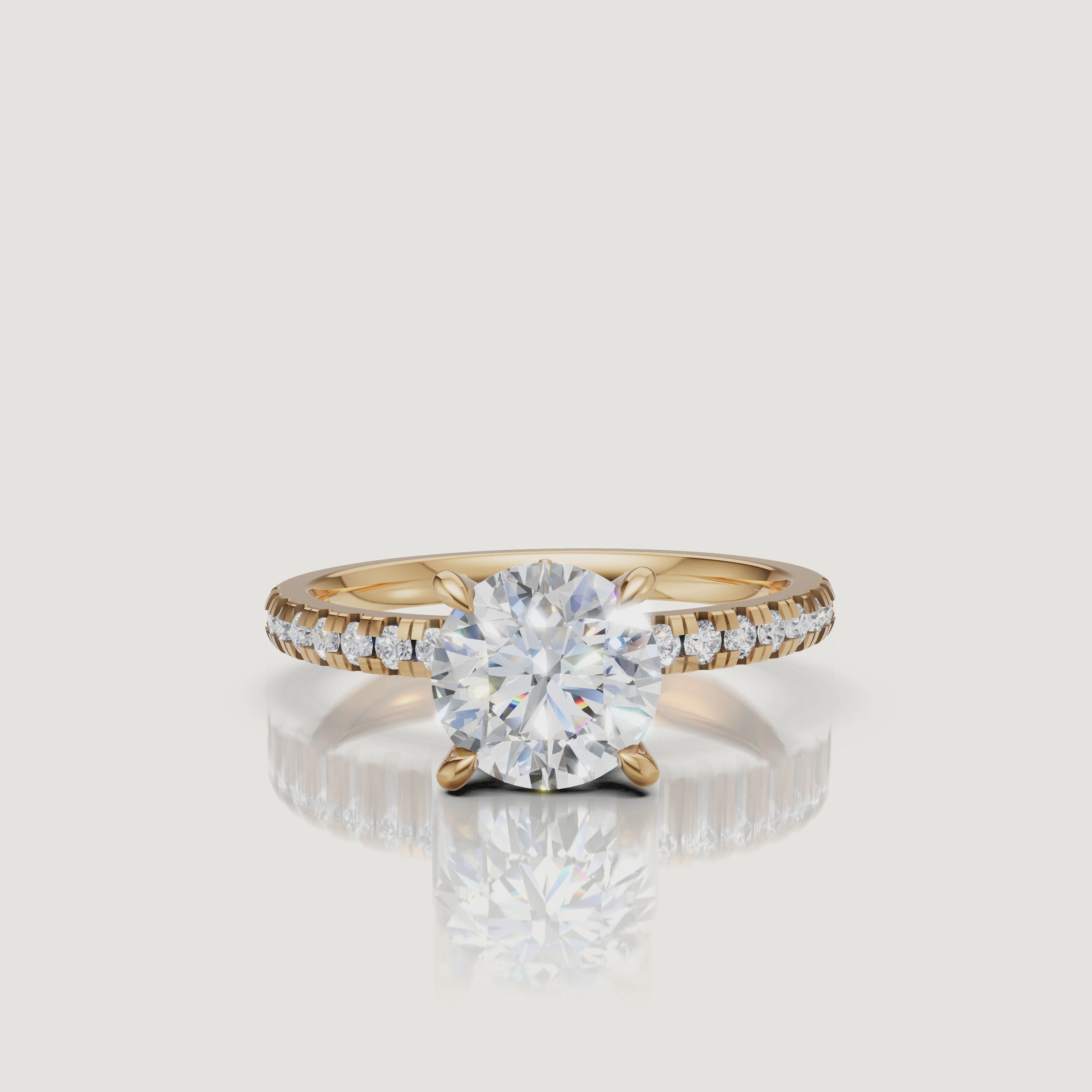 High-definition 360-degree video of a Raul Diamonds yellow gold round cut ring, highlighting the contrast between the warm gold band and the sparkling diamond facets.