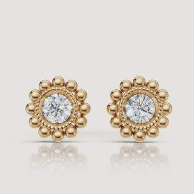 Yellow gold vintage halo diamond earrings cinematic jewelry video by Raul Diamonds