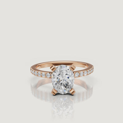 Oval lab grown diamond solitaire engagement ring with pavé band in 14K rose gold by Raul Diamonds video showcase