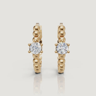 Yellow gold beaded diamond hoop earrings video by Raul Diamonds