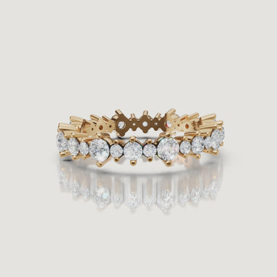 Yellow gold round diamond wedding band video with sparkling shared prong setting by Raul Diamonds