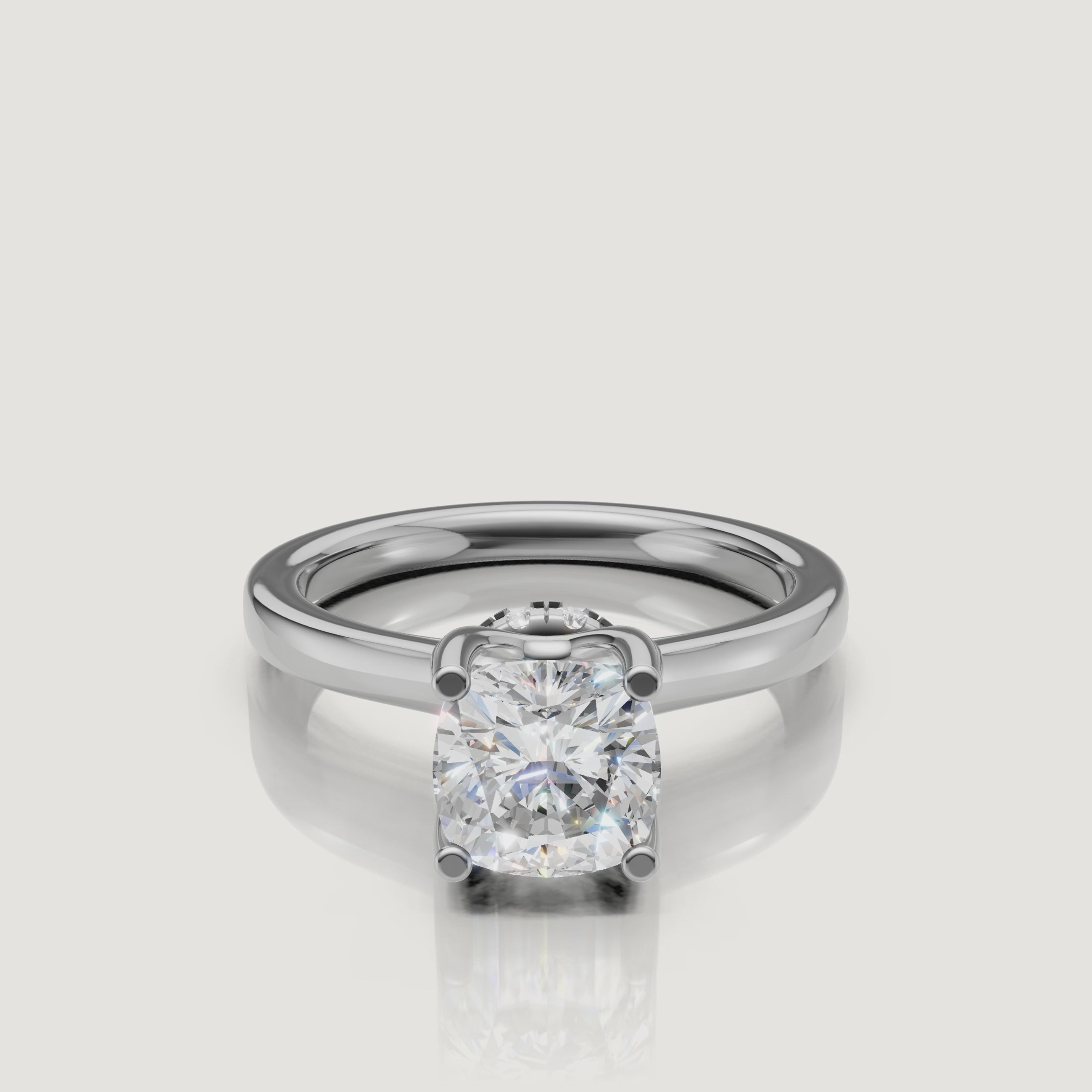 360-degree jewelry video of a Raul Diamonds white gold cushion solitaire, focusing on the light performance of the brilliant cushion cut diamond