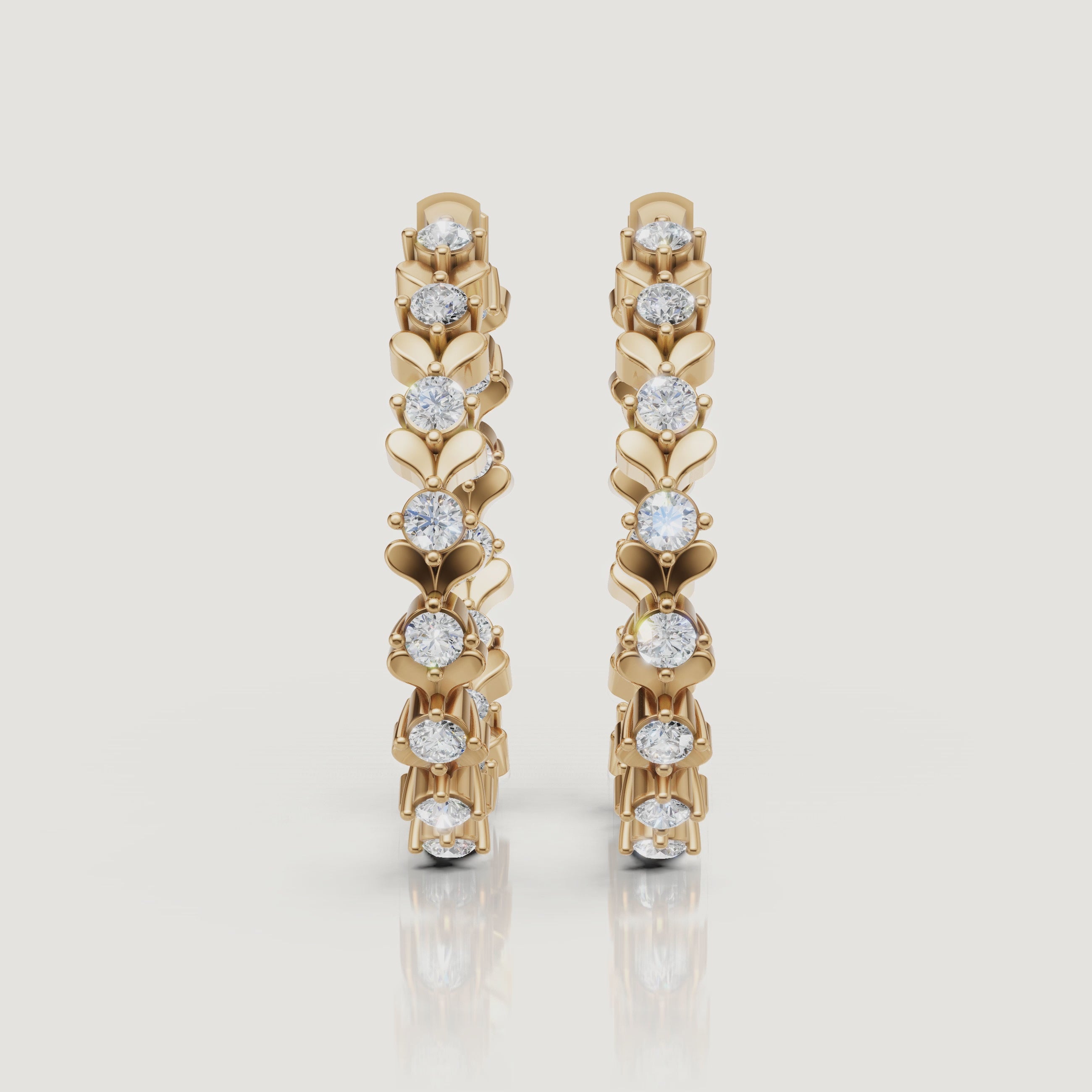 Yellow gold floral diamond hoop earrings cinematic jewelry video by Raul Diamonds