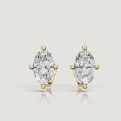 Yellow gold marquise diamond stud earrings video showcasing solitaire brilliance by Raul Diamonds