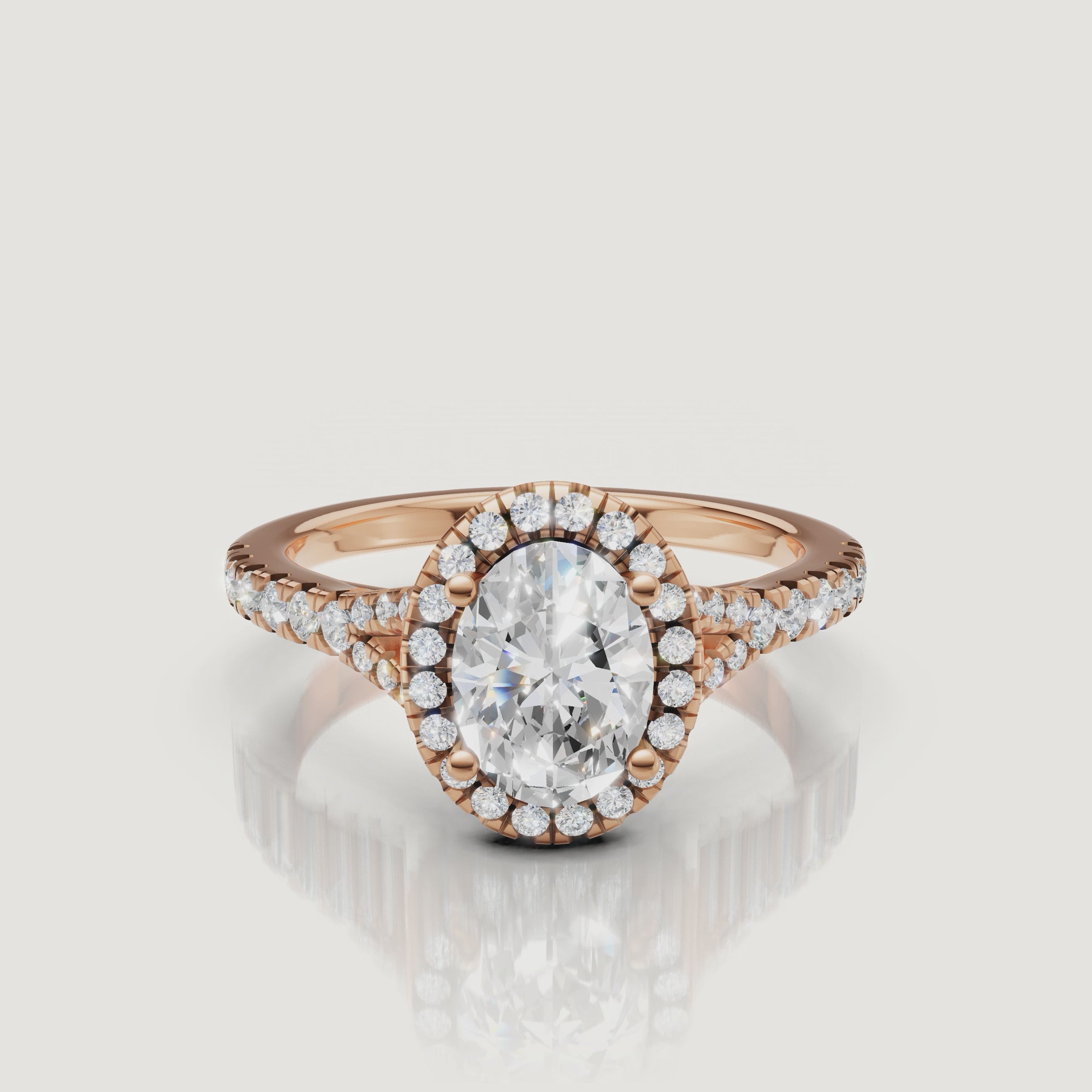 Cinematic close-up of a rose gold oval diamond halo ring, showcasing the elegant split shank and the warm pink glow of the metal.