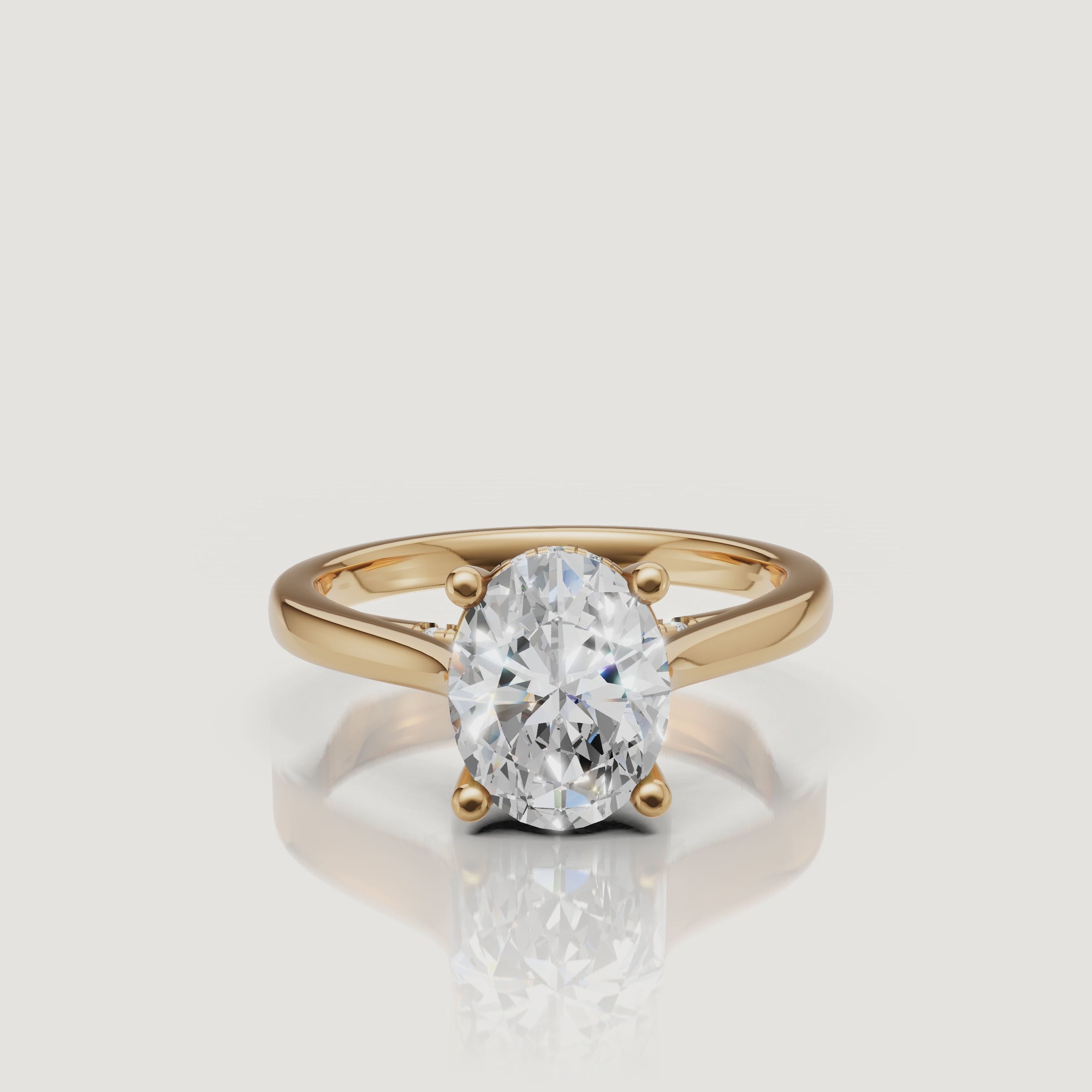 High-definition 360 showcase of a Raul Diamonds oval cut engagement ring in 18k yellow gold with a hidden halo