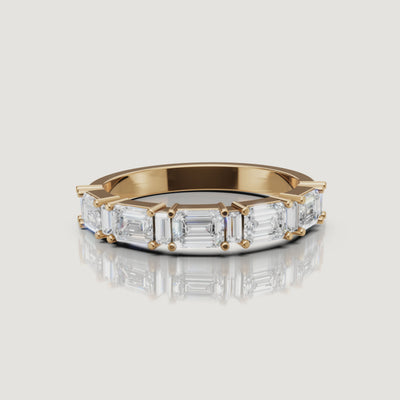 Raul Diamonds yellow gold emerald cut diamond wedding band video with sparkling eternity design