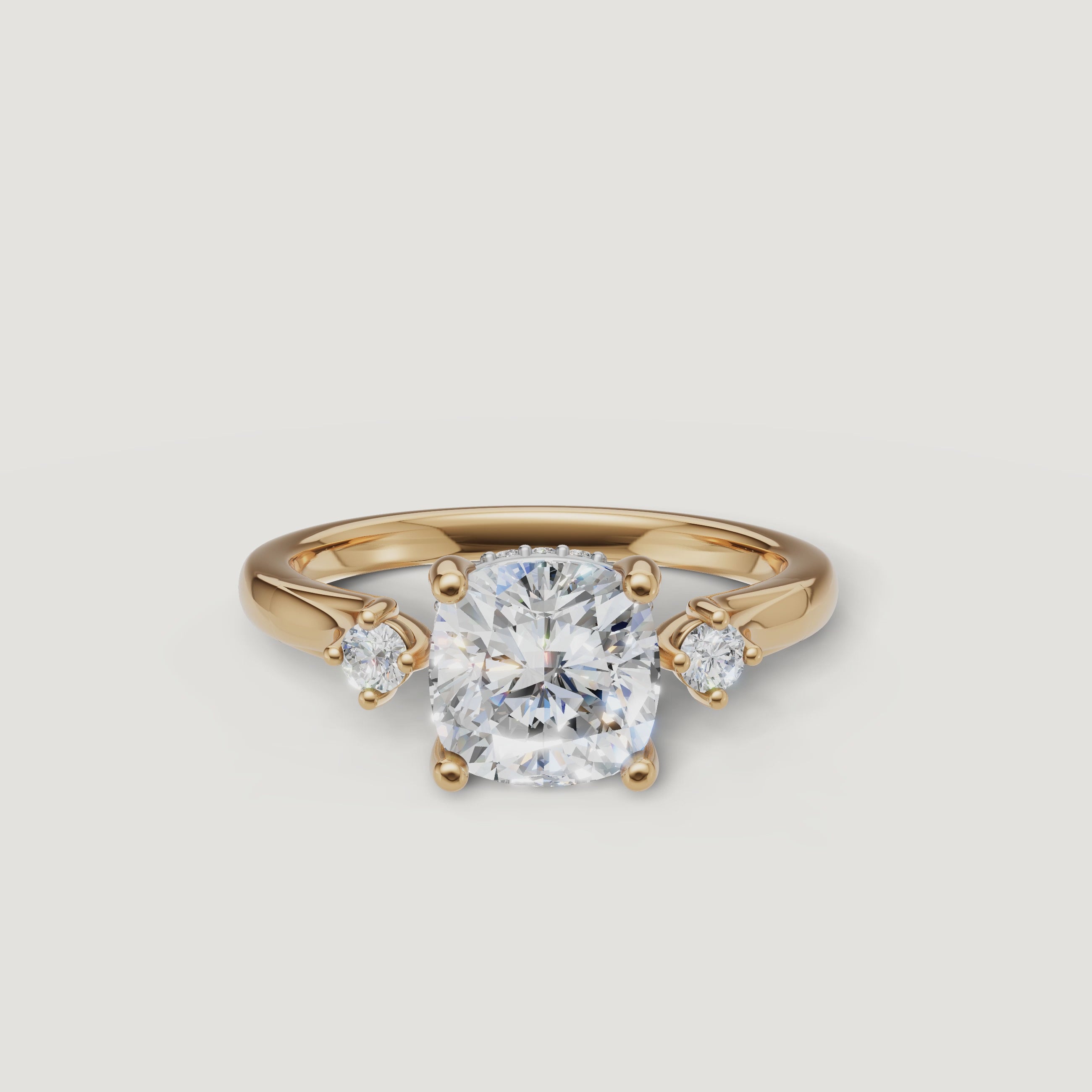 14K yellow gold cushion cut lab grown diamond engagement ring with round side diamonds by Raul Diamonds