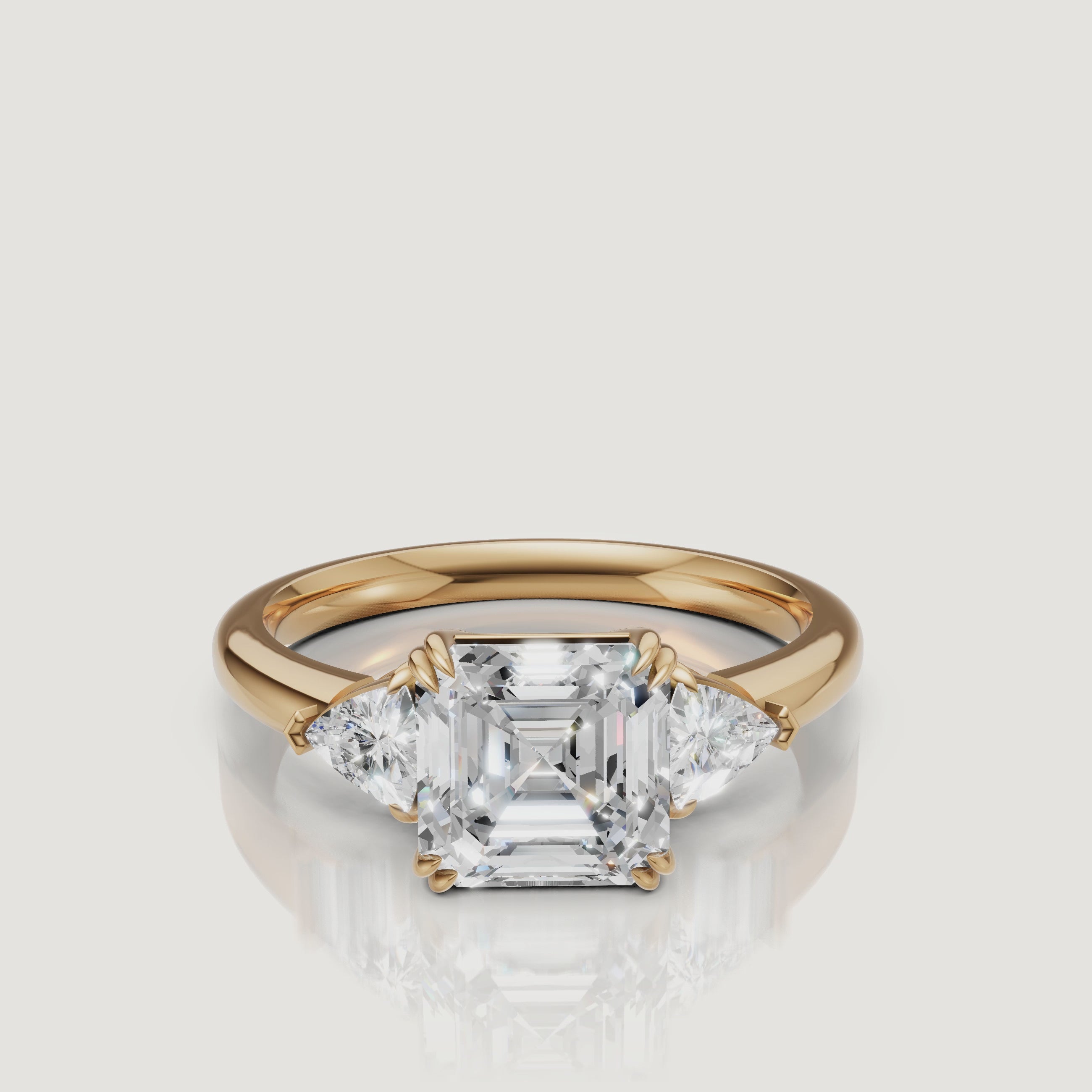 rotating view of asscher cut three stone lab grown diamond engagement ring with trillion side stones