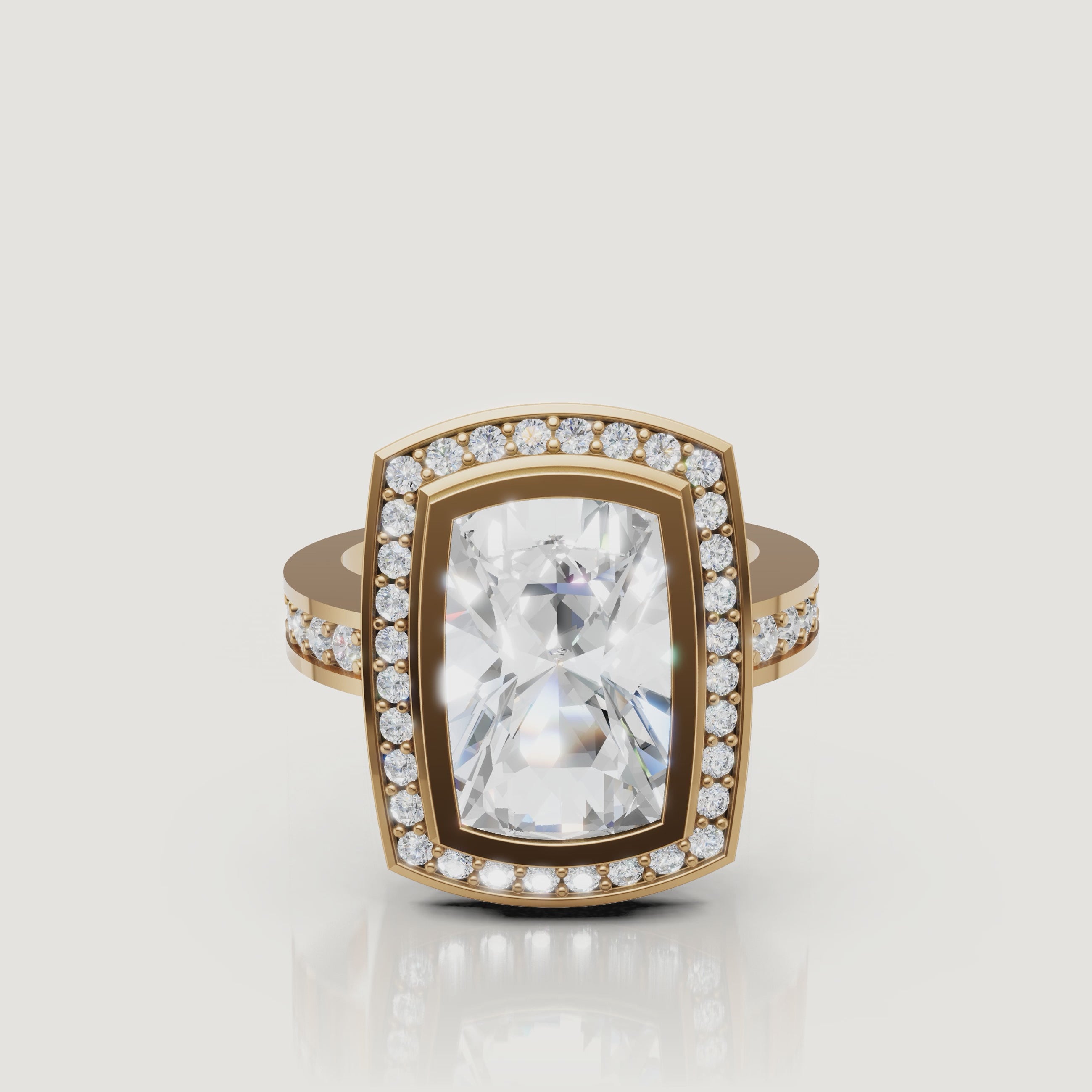 360 video of Raul Diamonds cushion cut halo engagement ring in yellow gold with pavé diamonds.