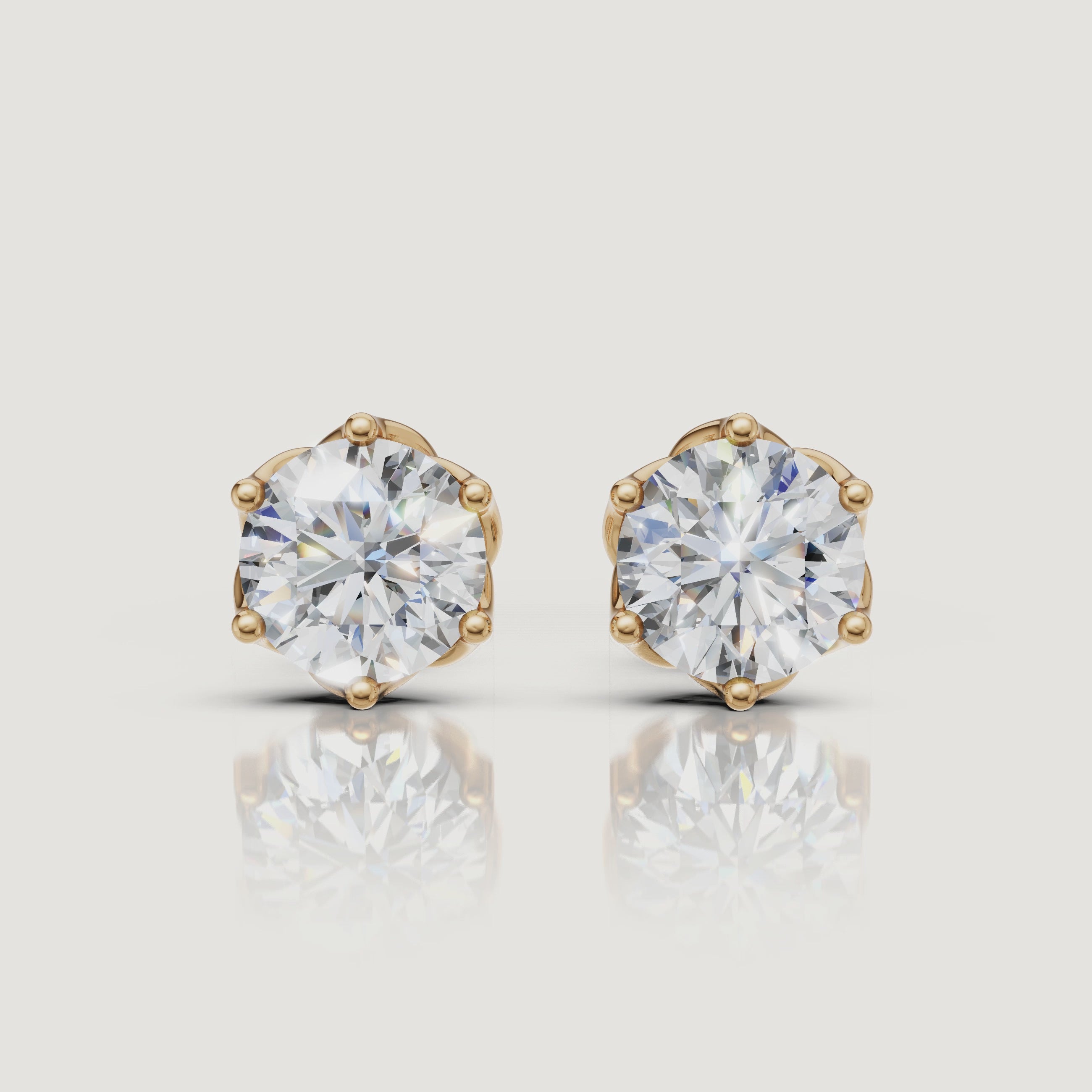 Yellow gold round solitaire diamond stud earrings sparkle video by Raul Diamonds