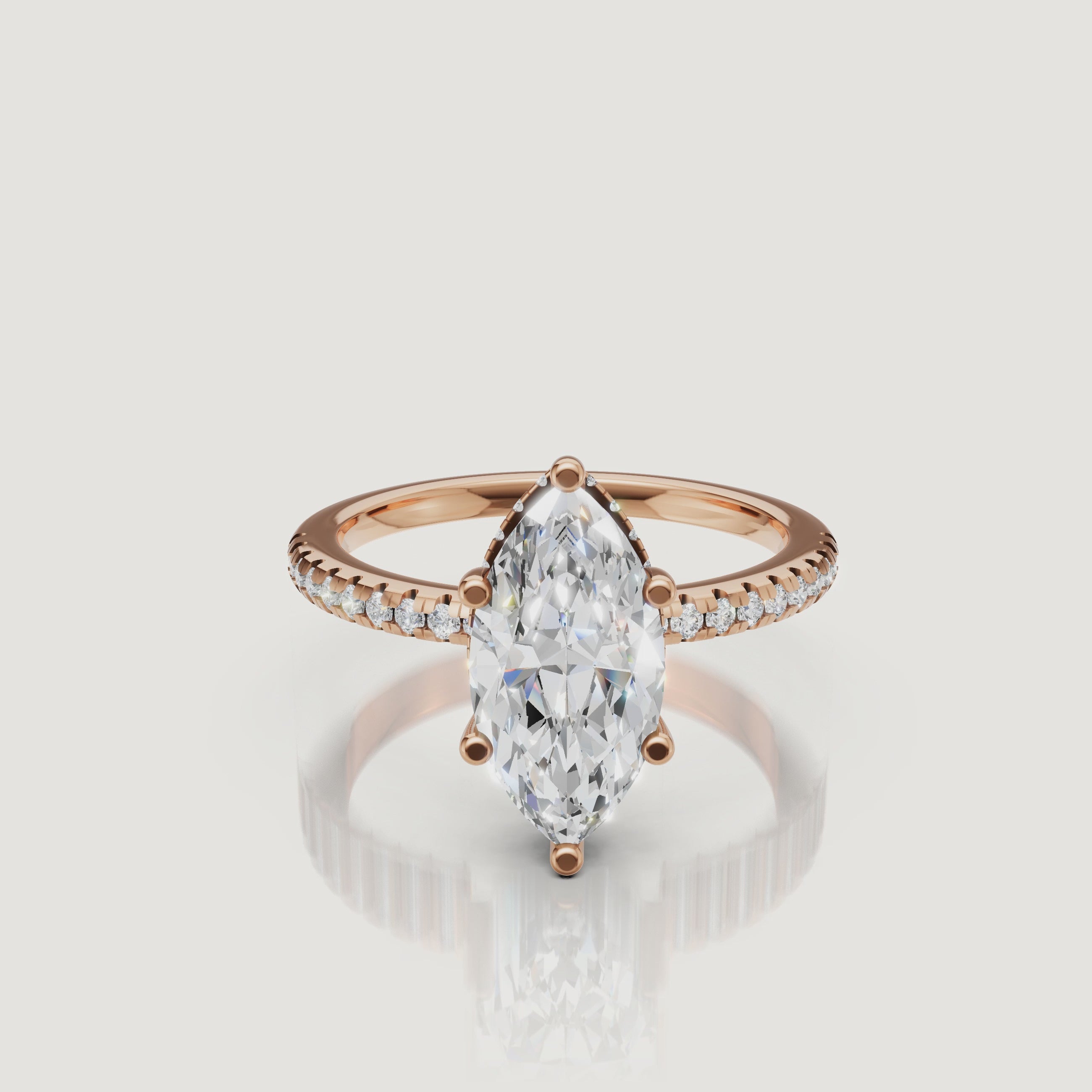 close up video of elongated marquise lab diamond solitaire ring in 14k gold