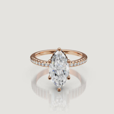 close up video of elongated marquise lab diamond solitaire ring in 14k gold
