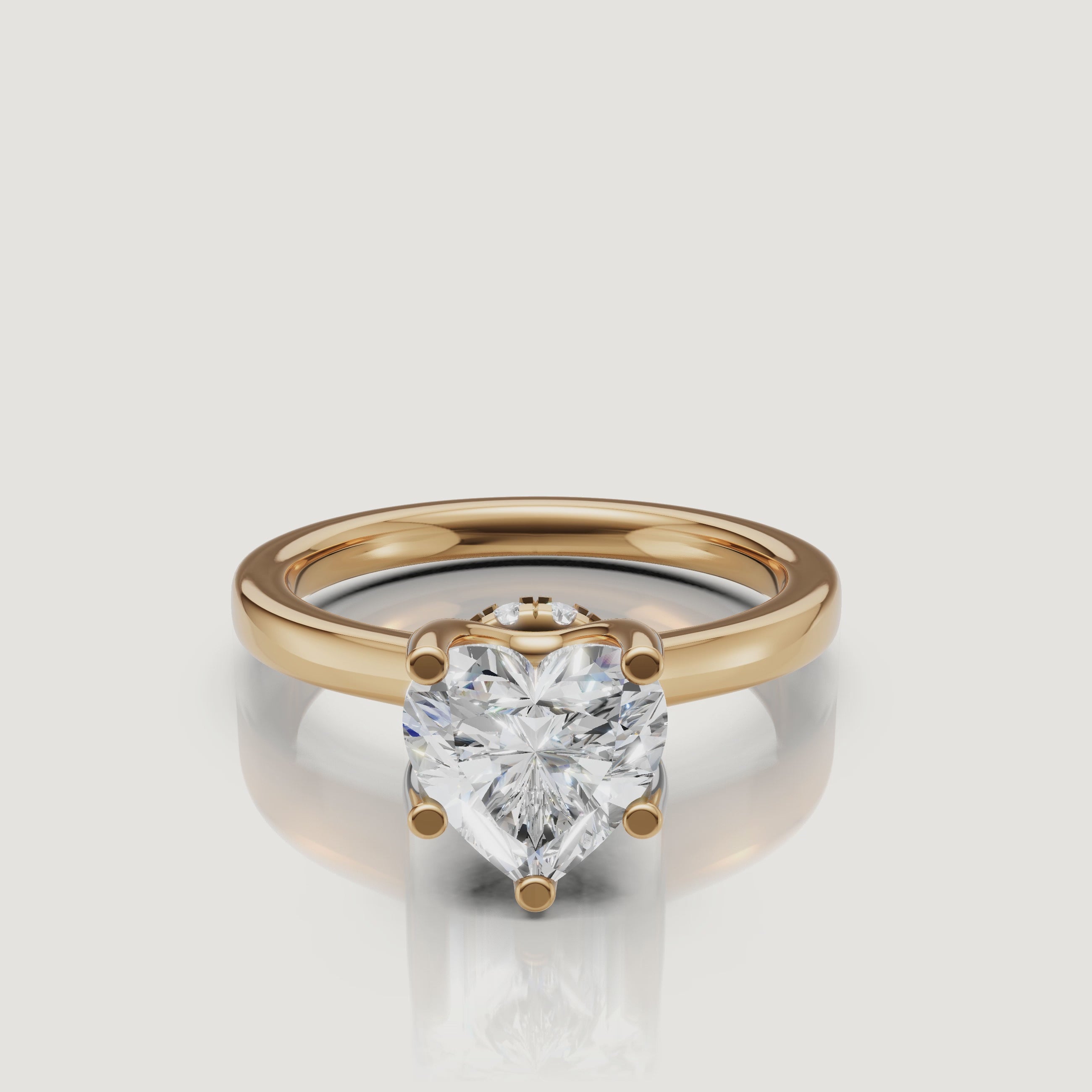 video of heart shaped lab grown diamond solitaire engagement ring in 14k yellow gold