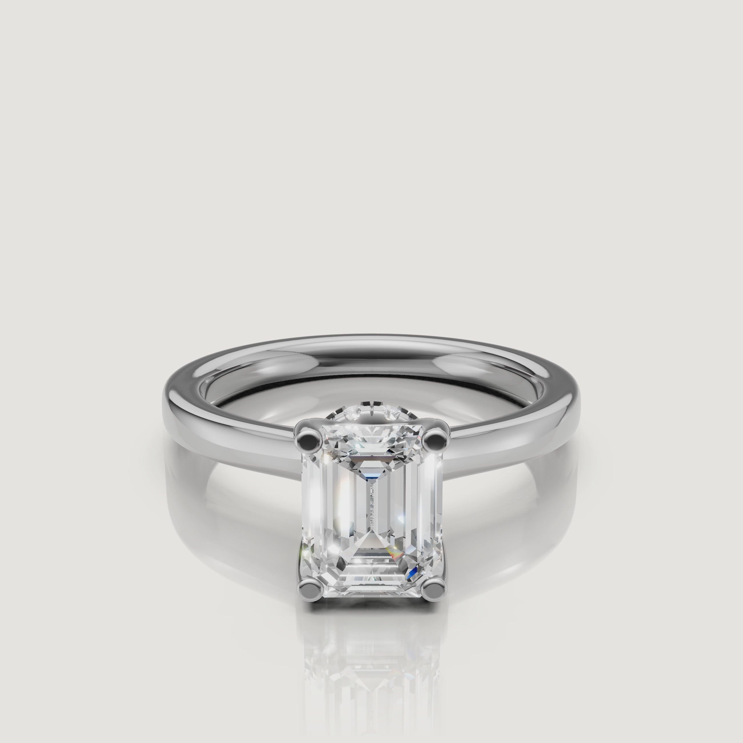 video of emerald cut lab grown diamond solitaire engagement ring in 14k white gold with hidden halo