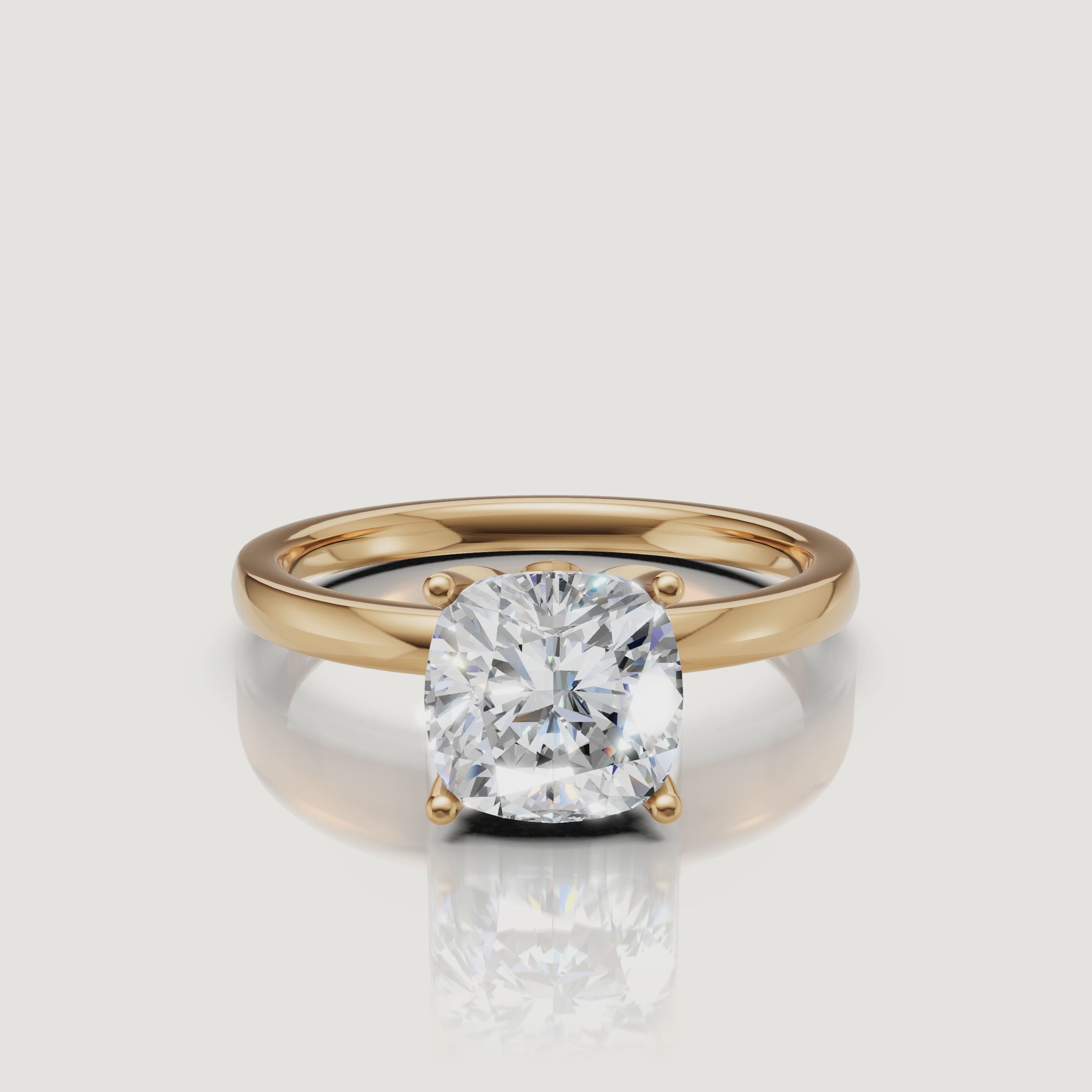 Detailed product video of a Raul Diamonds cushion cut solitaire ring in yellow gold, showcasing the fire and brilliance of the rounded-corner diamond.