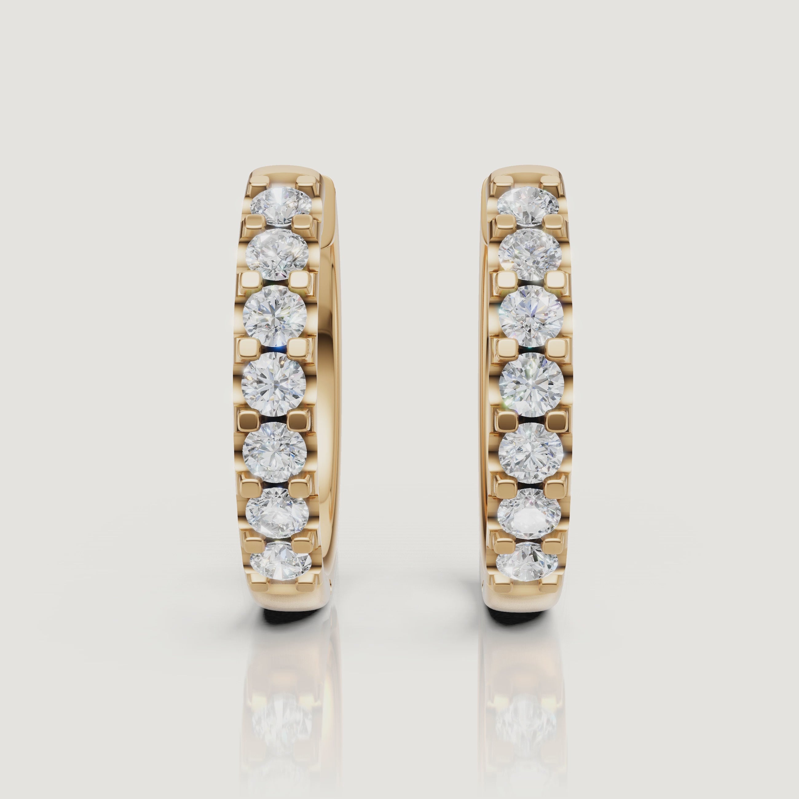 Yellow gold diamond hoop earrings video showcasing brilliant pave sparkle by Raul Diamonds