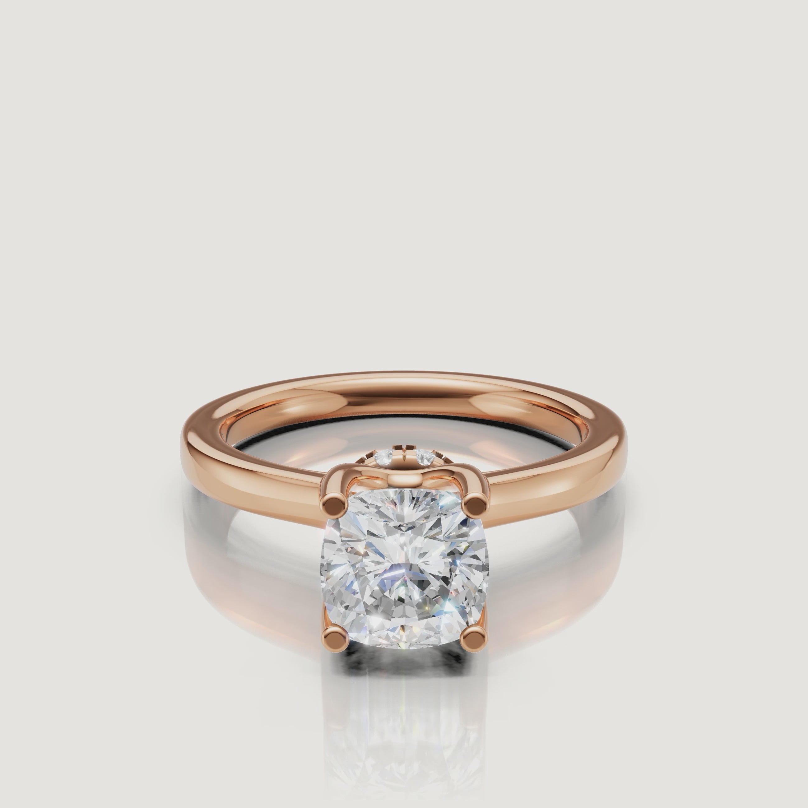 HD video of a Raul Diamonds rose gold cushion cut ring, highlighting the warm blush tones of the metal and the precision-cut diamond facets.